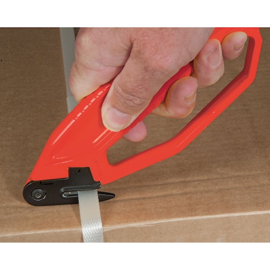 STANLEY 0-10-245 strap cutter with red handle in use on packaging, close-up photo.