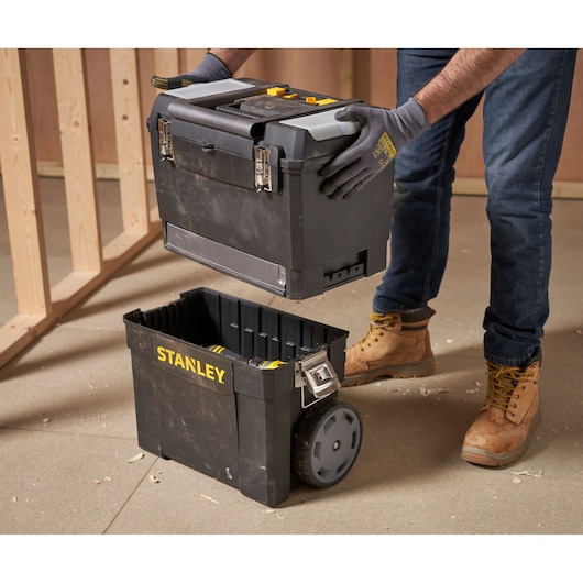 STANLEY 1-93-968 wheeled toolbox with removable top section in workshop setting.