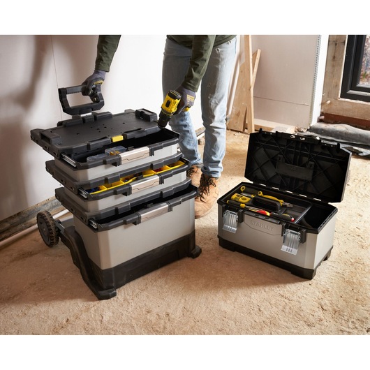 STANLEY 1-95-622 tool box set and open tool box with tools, photography of worksite floor.