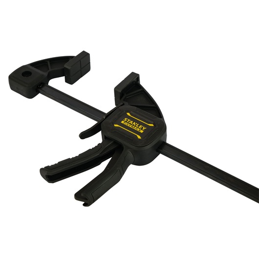 STANLEY FMHT0-83233 black trigger clamp, side angle, yellow logo, on white background.