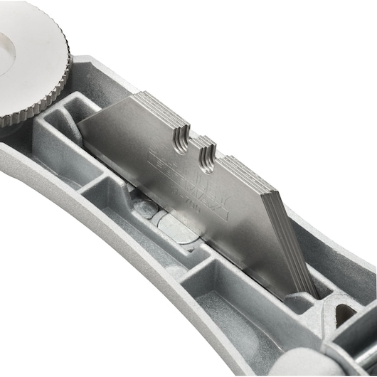 STANLEY FMHT10501-0 utility knife blade storage compartment, close-up side angle.