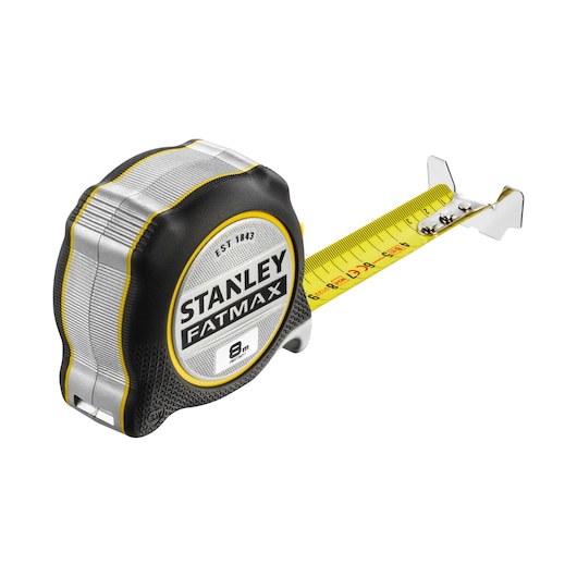 STANLEY FMHT38217-0 tape measure, FATMAX series, yellow blade, angled product photo on white background.