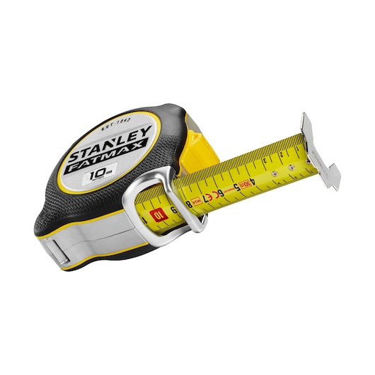 STANLEY FMHT38232-0 tape measure, yellow and black, extended blade, product angle on white background.