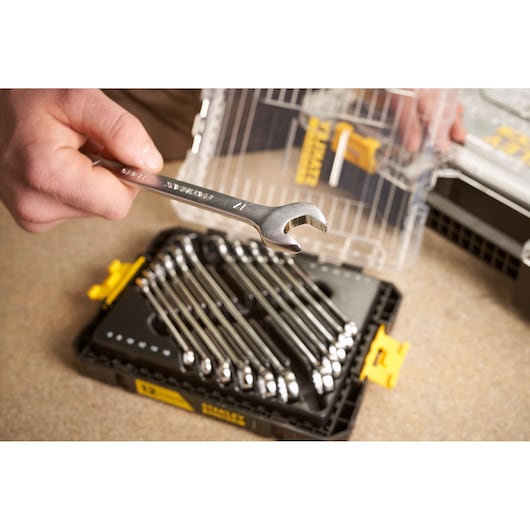 STANLEY FMMT98104-0 wrench set with multiple wrenches in black and yellow case, close-up view.