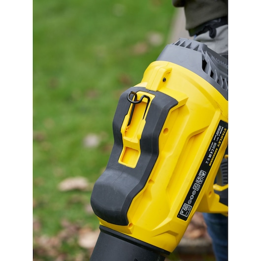 STANLEY SFMCBL7M1 yellow and black blower close-up outdoors, side angle.