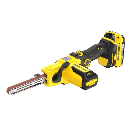 Photo of STANLEY SFMCE210D2 cordless belt file sander, yellow and black, angled on white background.