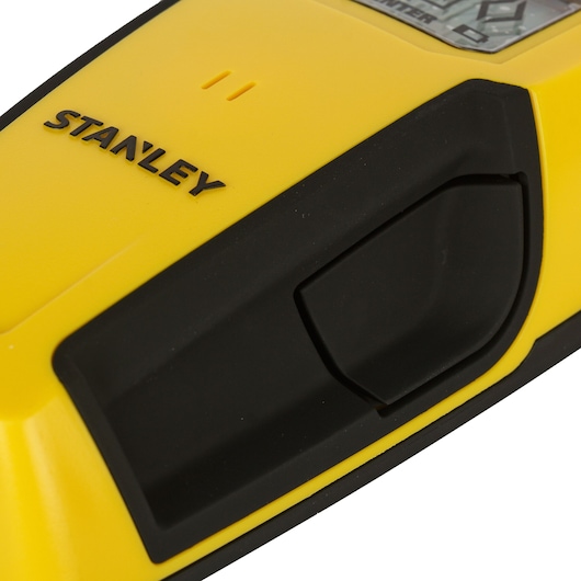 STANLEY STHT0-77406 electronic stud finder close-up, yellow and black body, angled view.