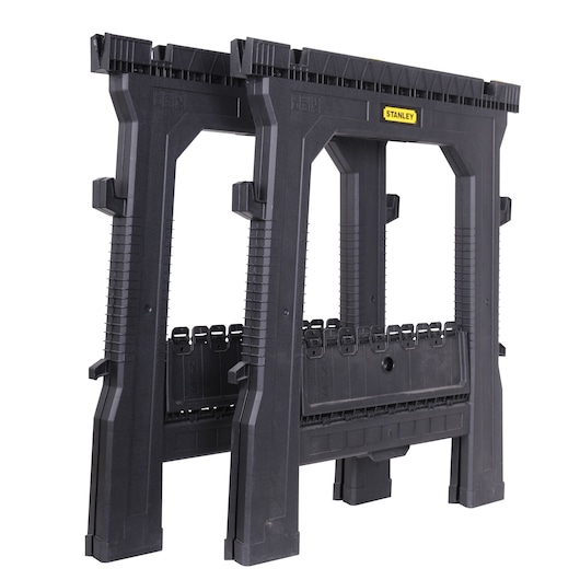 STANLEY STST1-70713 folding plastic sawhorse pair, black, side angle, white background.