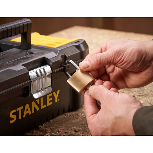 STANLEY STST1-75515 toolbox front angle with padlock being locked on latch.