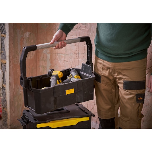 STANLEY STST1-79231 tool caddy with metal handle, photo of product in use with power tools inside